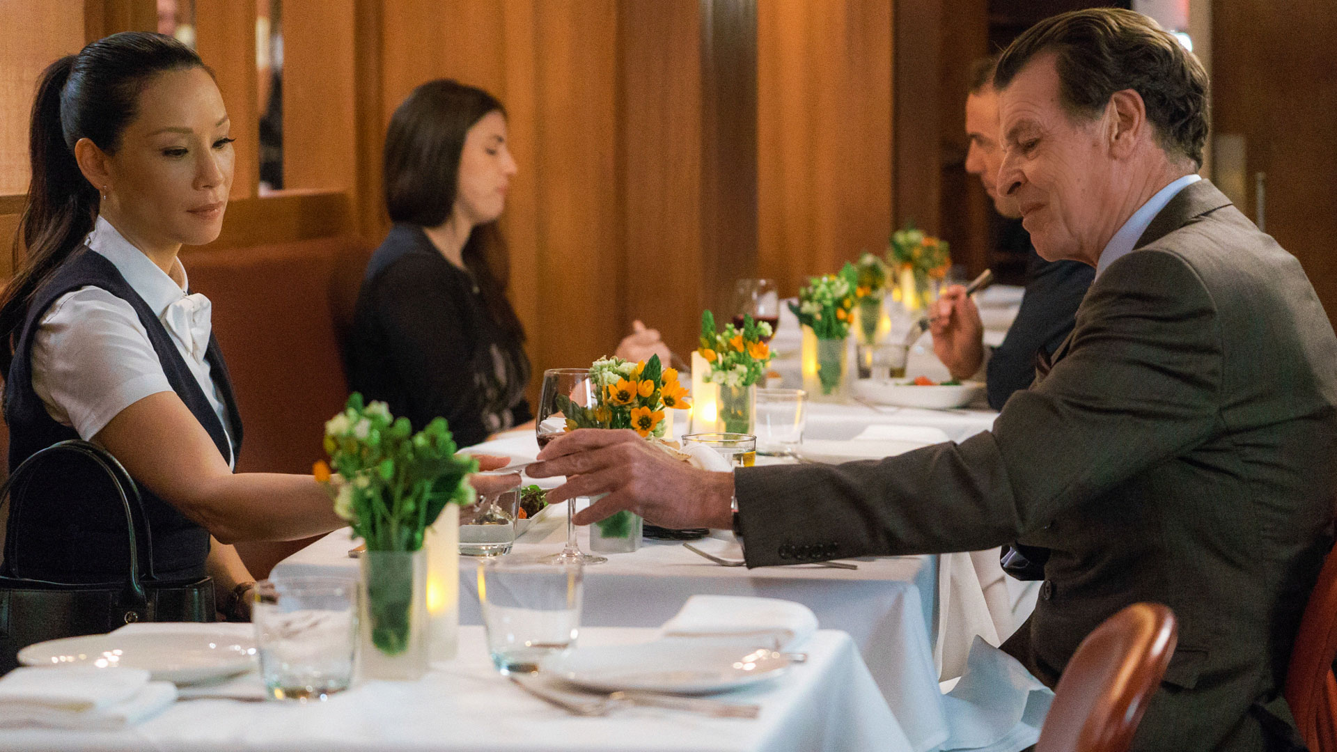 Lucy Liu as Dr. Joan Watson and John Noble as Morland Holmes