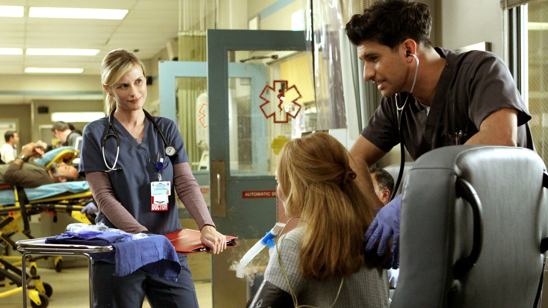 Bonnie Somerville as Dr. Christa Lorenson and Raza Jaffrey as Dr. Neal Hudson