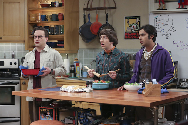 Leonard, Howard, and Raj are shocked while cooking in the kitchen.