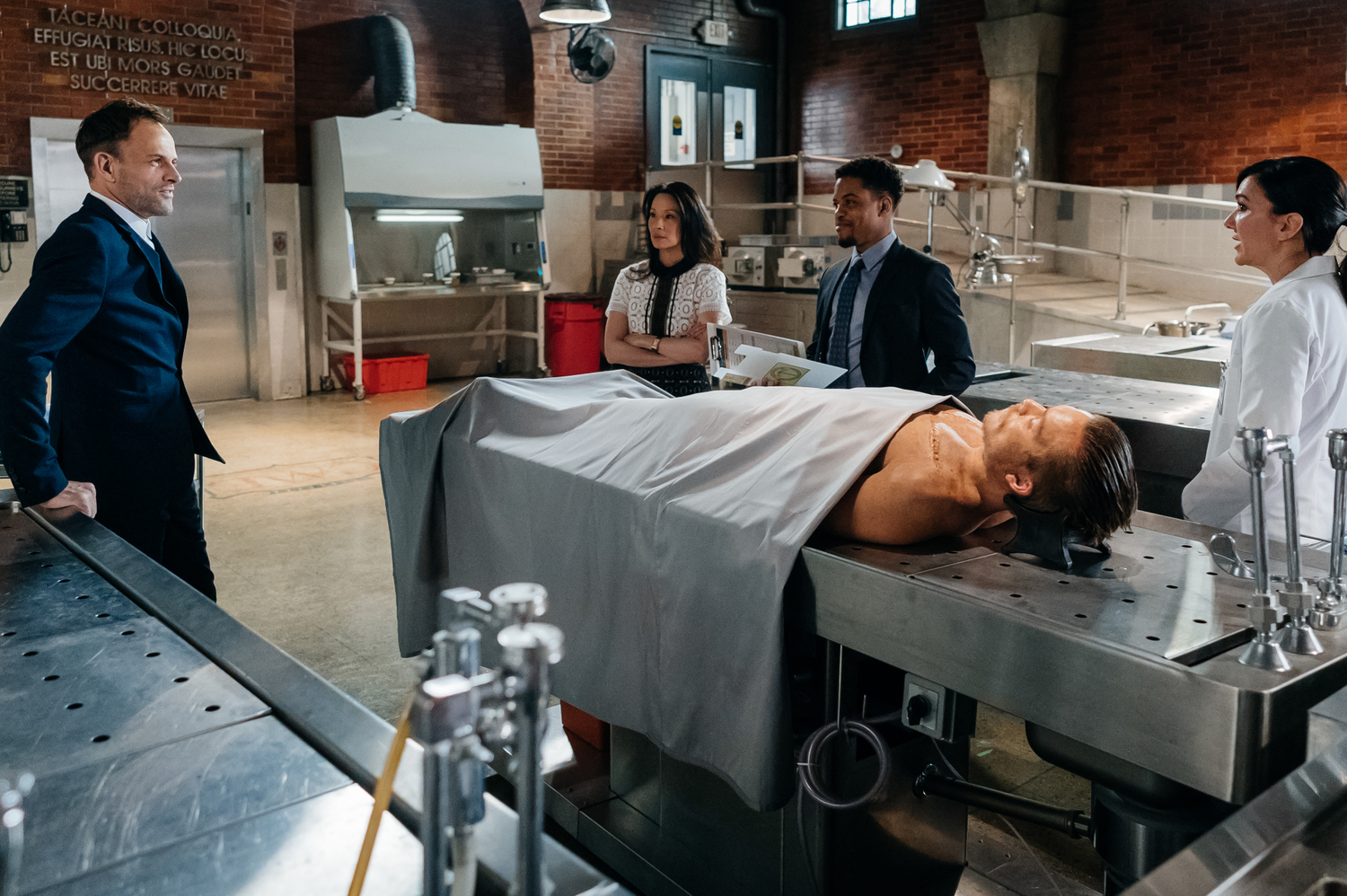 The cast relaxes before the scene
