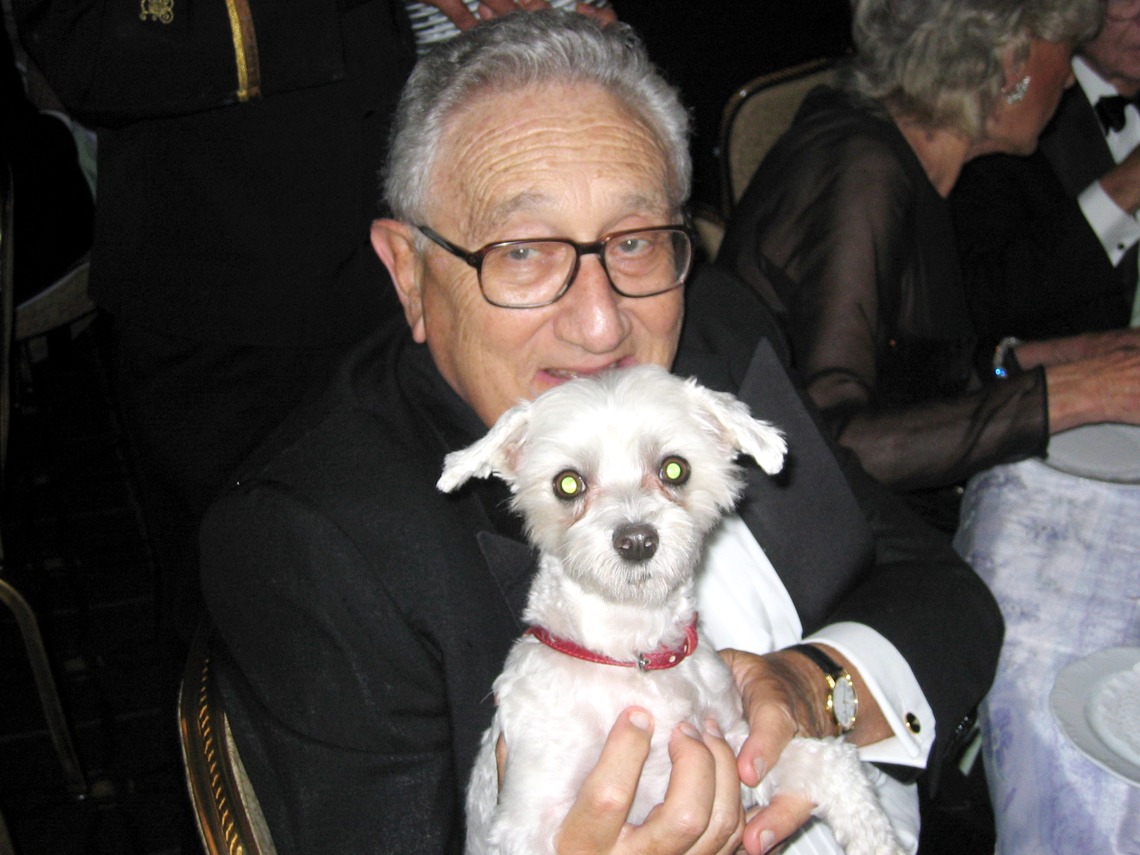 1. Henry Kissinger With a Dog in Headlights