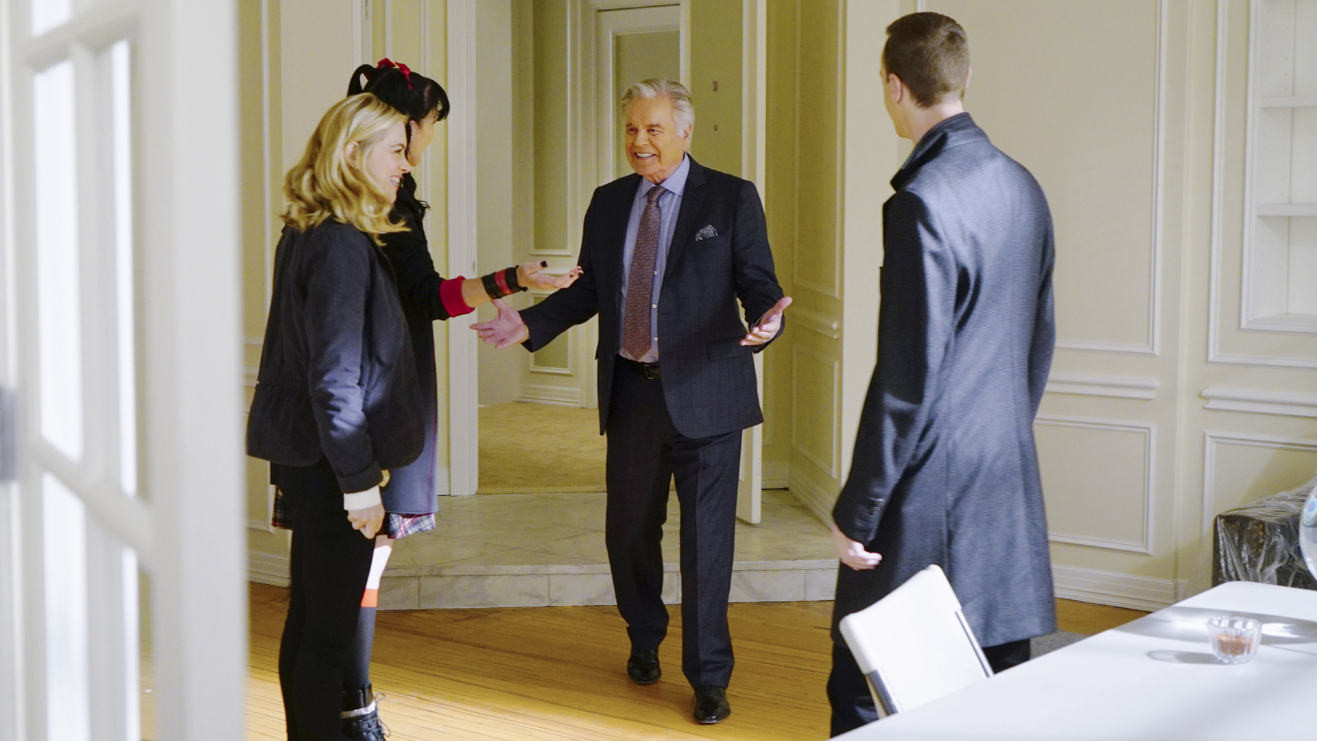 Anthony DiNozzo, Sr. greets Bishop, Abby, and McGee.