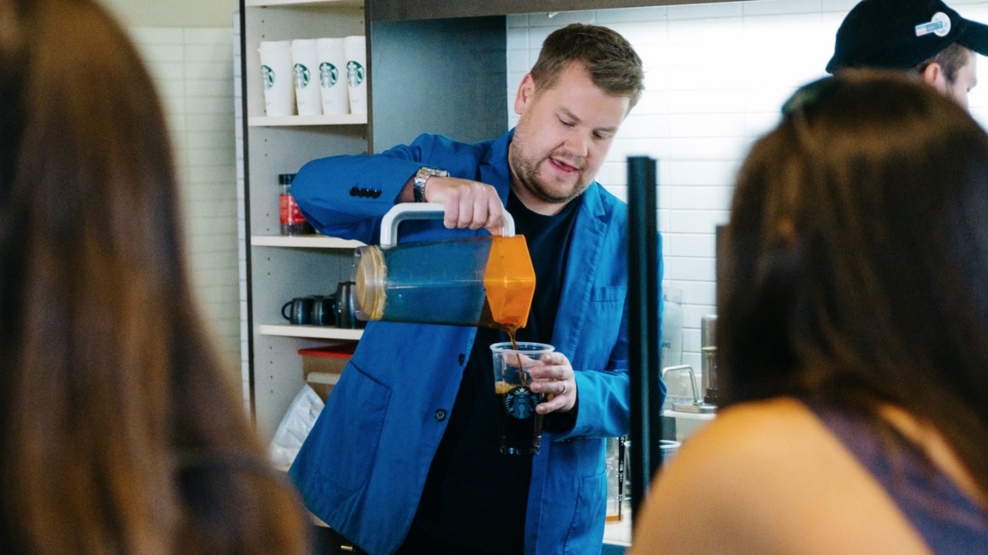 James pours himself a cup of joe to keep his creative juices flowing.