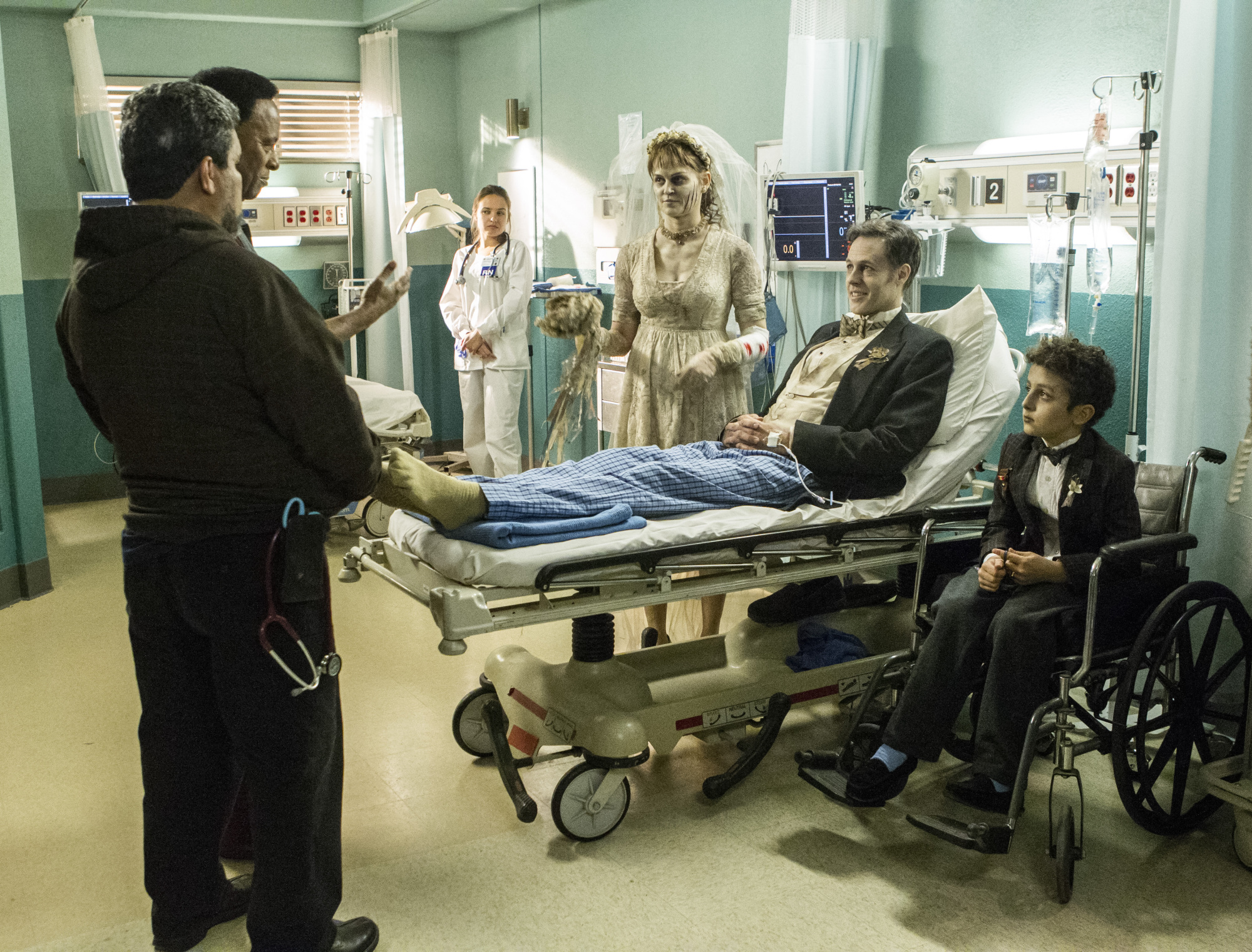 Luis Guzmán as Jesse Sallander and William Allen Young as Dr. Rollie Guthrie