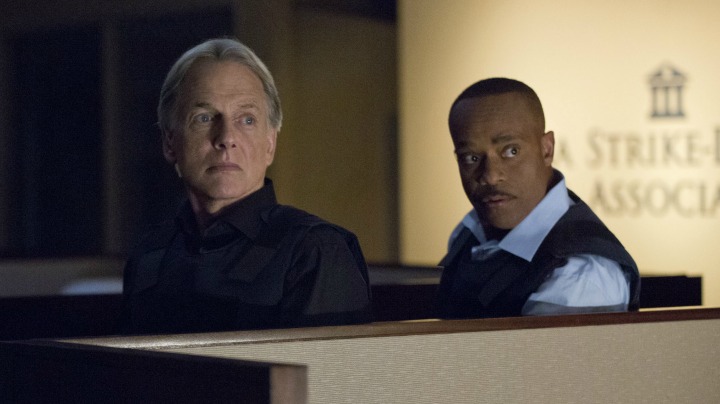 Mark Harmon as Leroy Jethro Gibbs and Rocky Carroll as Leon Vance