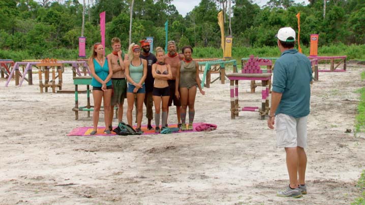 The castaways listen while host Jeff Probst explains the rules of the next challenge.