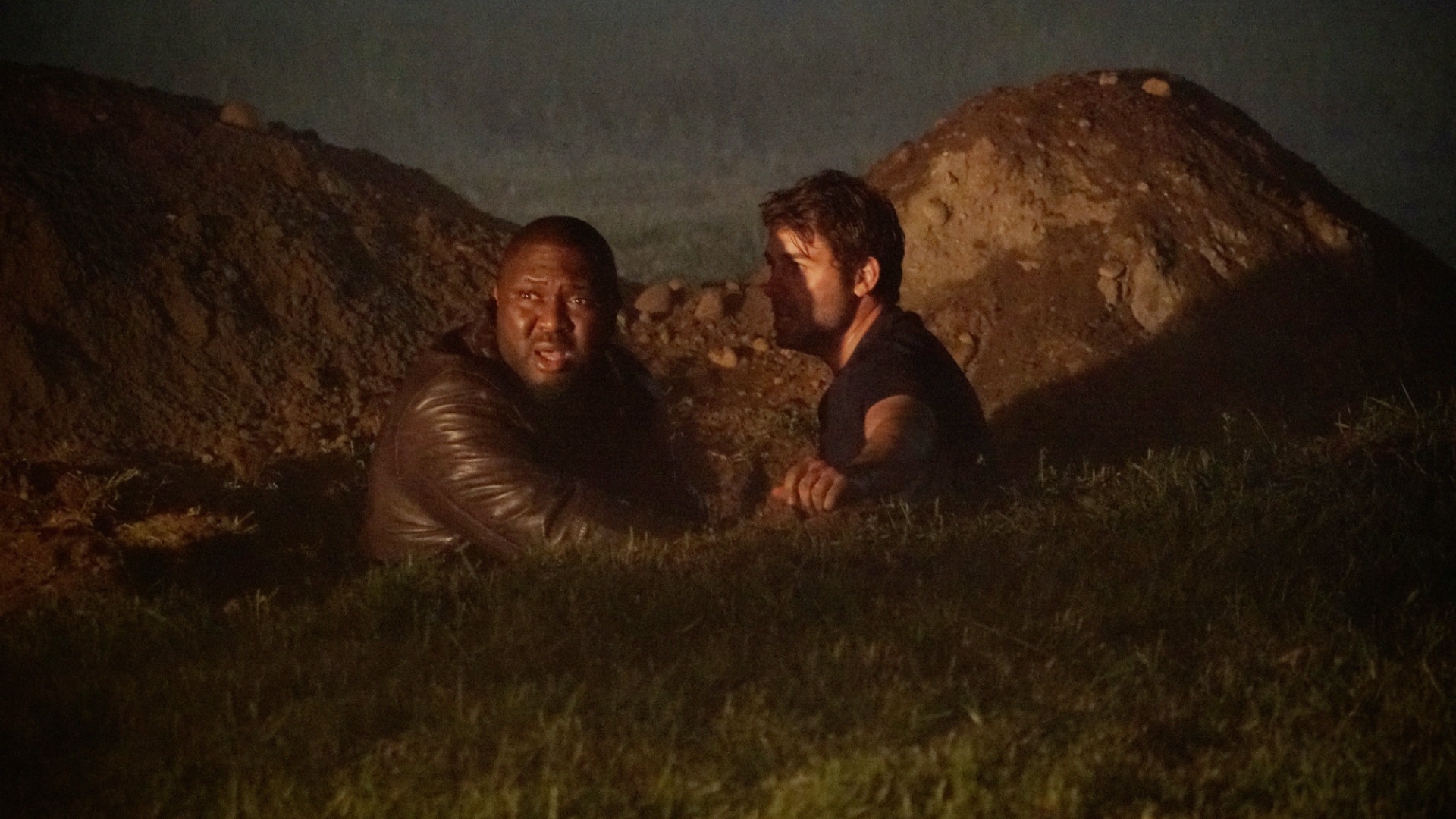 Abraham and Jackson start digging.